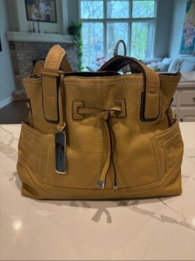 Tignanello Mustard Yellow Leather Shoulder Bag with Drawstring